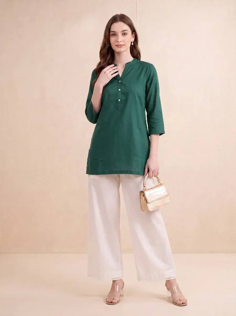On-model AI photoshoot of the green kurta generated by GenWear